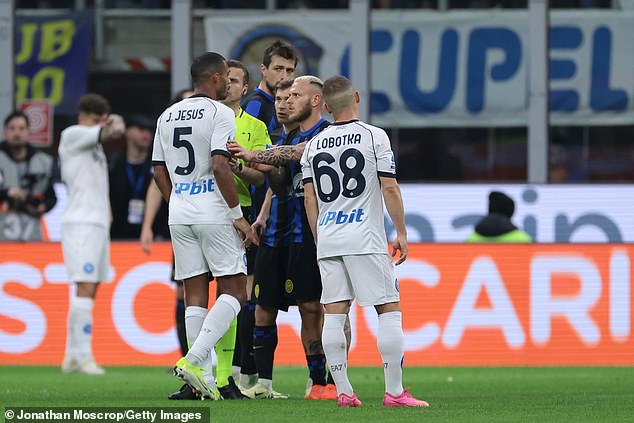 The Napoli defender was visibly upset and called on the referee to intervene