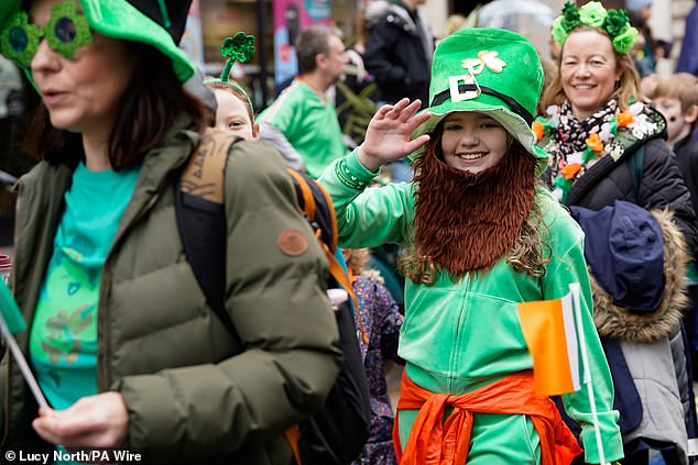 LONDON: A child in a leprechaun-themed outfit takes part in the parade in Trafalgar Square