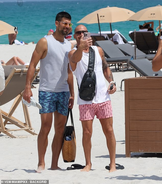 Happy to oblige, Djokovic, who lost at Indian Wells, stopped to make sure the fan got his snap