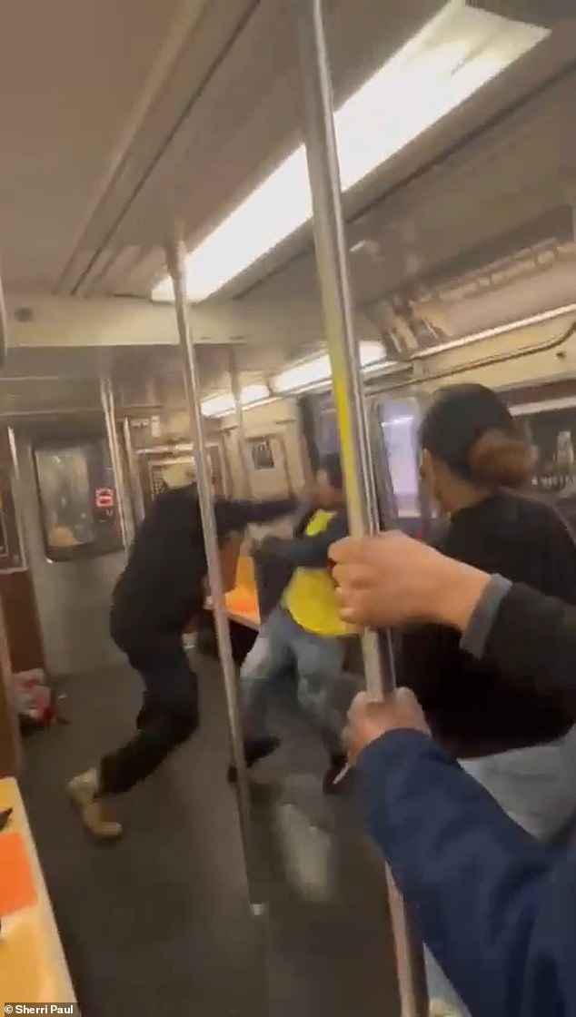 Two men broke out into a wild brawl on a New York City subway on Thursday, moments before the agitator was shot in the head with his own gun