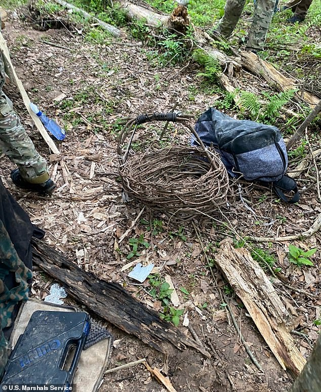 He had made a basket from small branches and even set up an early warning system using string and old cans.