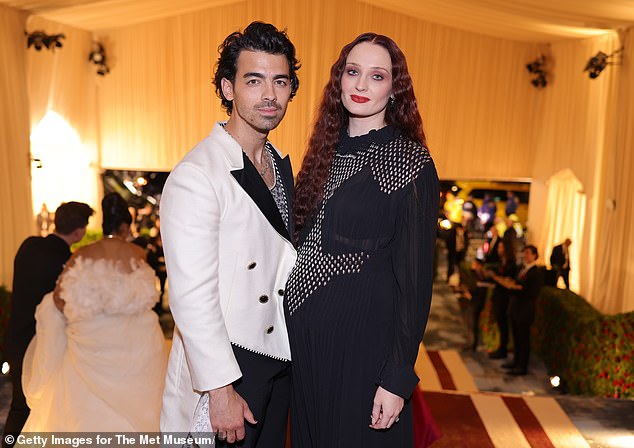 Sophie and Joe started dating in 2016. They got engaged in 2017 and had a shotgun wedding in May 2019 before properly getting married a month later;  seen in May 2022 in NYCa