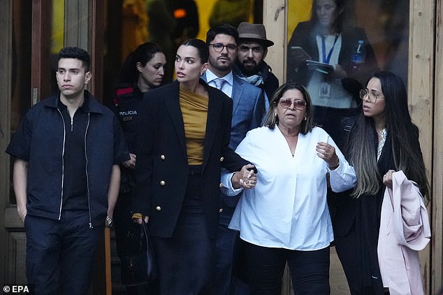 Dani Alves' family are seen leaving court during the trial last month - including ex-wife Joana Sanz (centre left) and mother Lucia (centre right)
