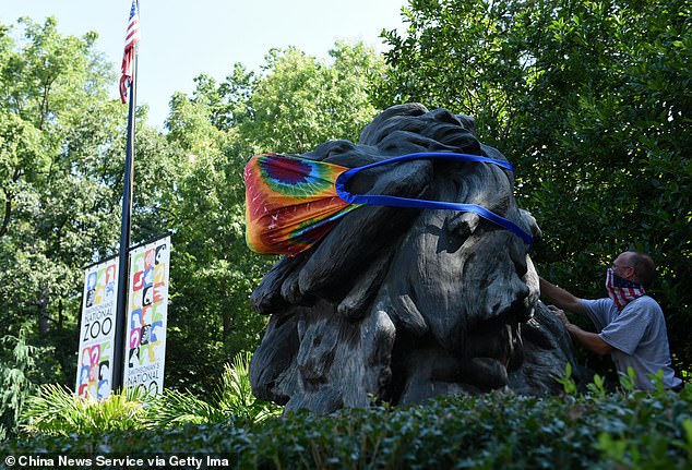 A tourist visits the Smithsonian's National Zoo during the pandemic in August 2020