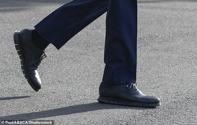 Biden stepped out in dress shoes with flexible grooves in the sole as he made his way to Marine One