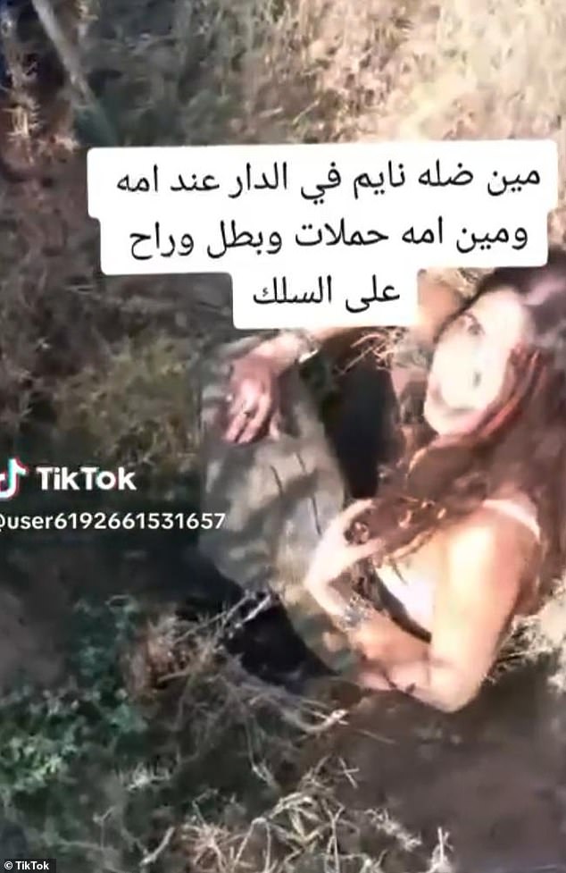 A viral TikTok video showed Ms Yanai pleading for her life (pictured) after she was found in a tree by Hamas terrorists, before being dragged away by the terrorists in a jeep to Gaza.