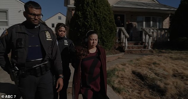 Andaloro entered the house, flanked by reporters, after an unknown woman opened the door.  Inside, she was greeted by two men who were eventually led away by police