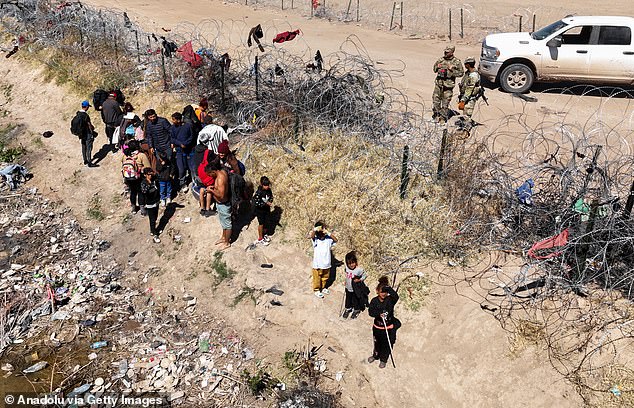 Migrants attempt to cross the North American side of the border between El Paso and Ciudad Juarez, Mexico, in Texas, United States on March 3, 2024