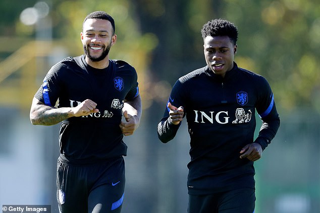 The attacker, pictured training with Promes in 2020, claimed people 'don't know the Quincy Promes I know'
