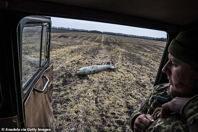 Ukrainian soldiers unload explosive charges in the Adiivka front line as the war between Russia and Ukraine continues in Adiivka, Donetsk Oblast, Ukraine on March 13, 2024