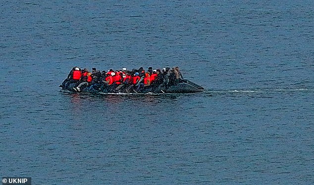 Photos show the boat struggling under the weight of the many people on board