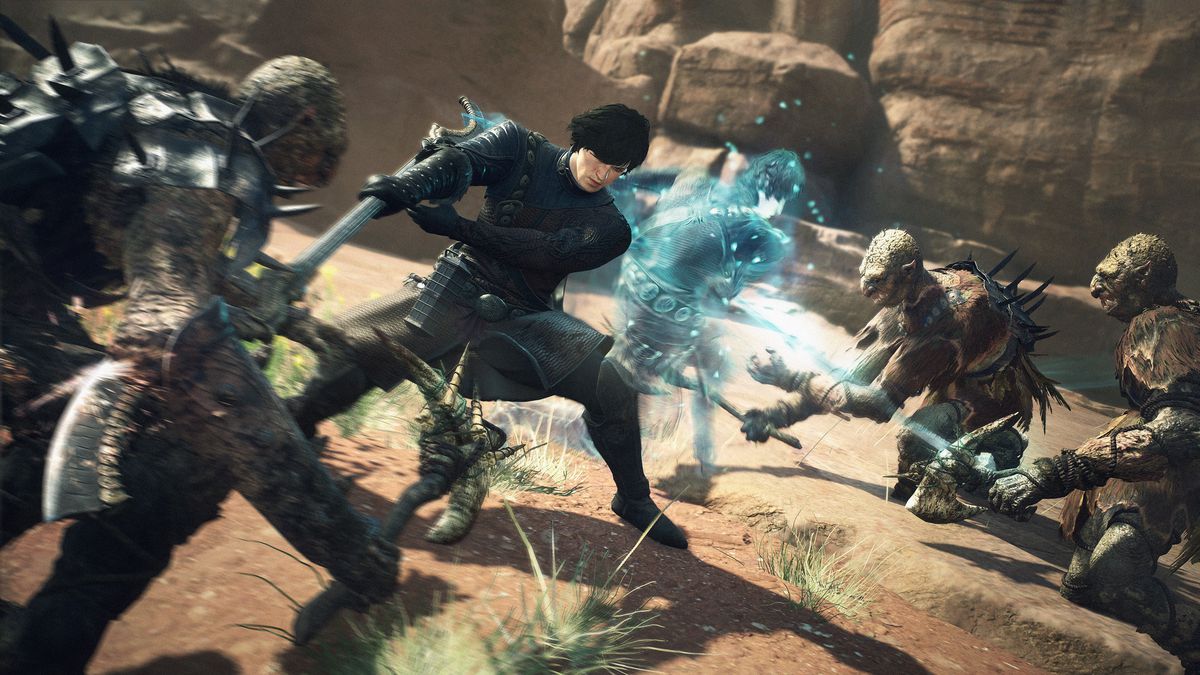 A dark-haired male mystic spearhand Arisen slashes at a trio of goblins in a screenshot from Dragon's Dogma 2