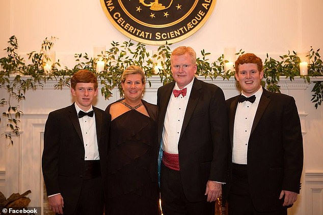 The disgraced lawyer tried to use his late mother Libby as an alibi in the murder of his wife and son.  He is pictured with his wife Maggie and their two sons Paul (left) and Buster