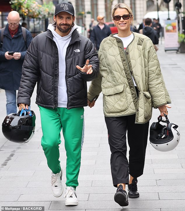 The Irish model, 38, looked cool in sunglasses and cropped black trousers with a light green quilt-style jacket and black trainers, finished with medium gold hoops