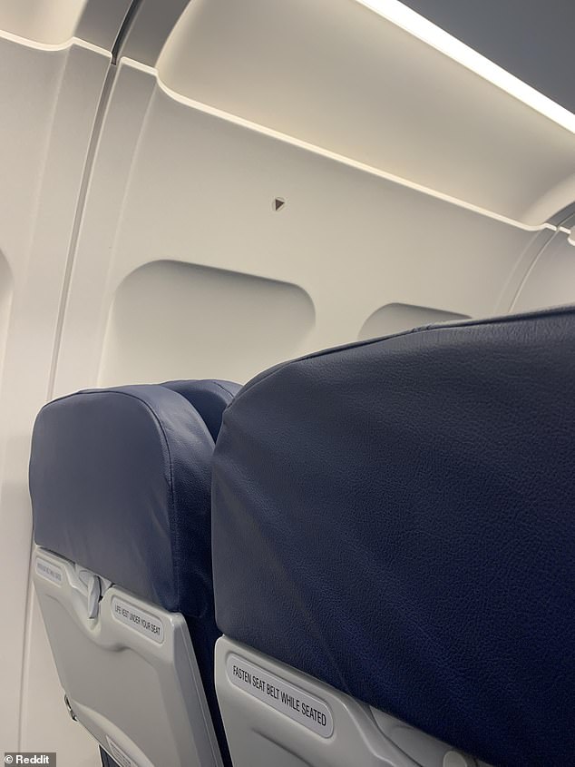 She said the stickers above the center windows give passengers the best view of the wings and also let flight attendants know the 