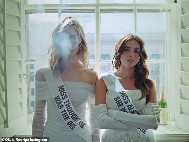 The first two women scene in white are side by side with sashes: 'Miss Thought She Was the One' and 'Miss Thought She Was the One'