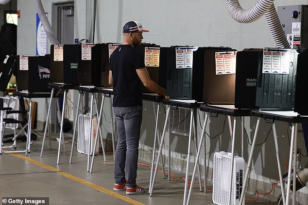 A poll worker prepares voting booths in Florida ahead of the March 19 primary.  More than 155,000 Floridians voted for Haley during the Republican Party primaries.  In Arizona, more than 108,000 people voted for Haley in the battleground state