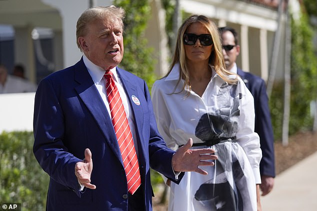 Trump speaks to reporters after voting during the Florida primary on March 19