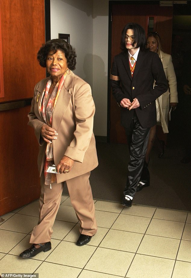 Katherine led the way as she walked with her late son during his trial in Santa Barbara, California in 2005