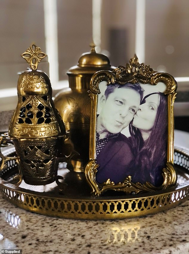 Zagi Kozarov also has a shrine to ex-lover Zoran Vidovic in her home with a religious lamp and a black and white photo of the two of them in a loving embrace (pictured)