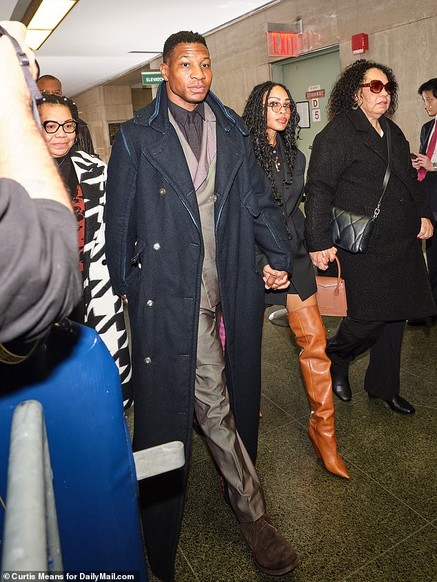 Majors arrives at the Manhattan courthouse with his girlfriend Meagan Good by his side