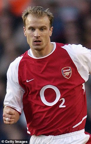 Bergkamp played for Arsenal for more than a decade and his grandson and daughter posed outside his statue outside the Emirates