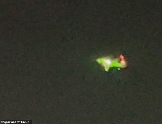 In the footage, the plane glowed green because of all the blinding lasers