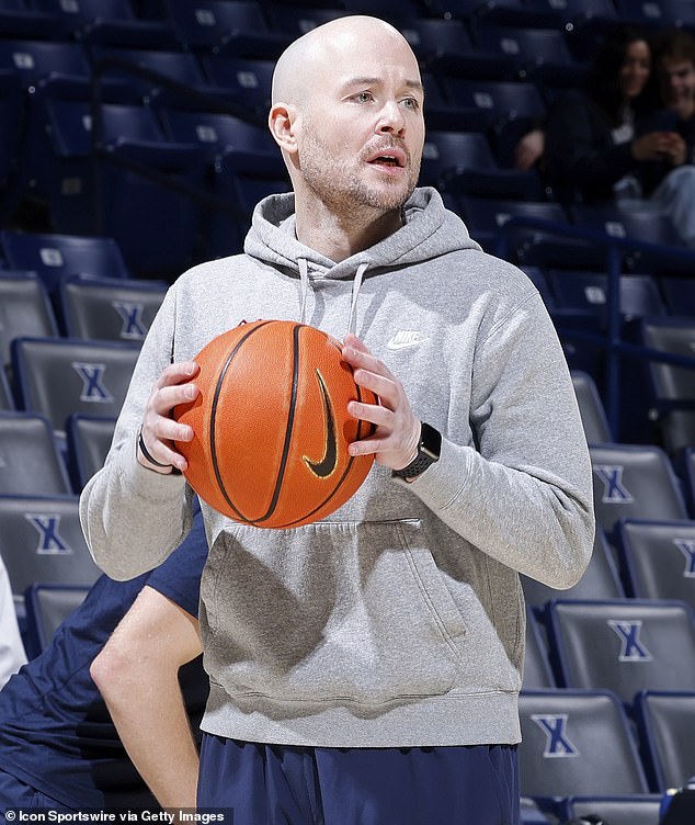 That's so he could watch his son Luke Murray, an assistant coach for the Huskies