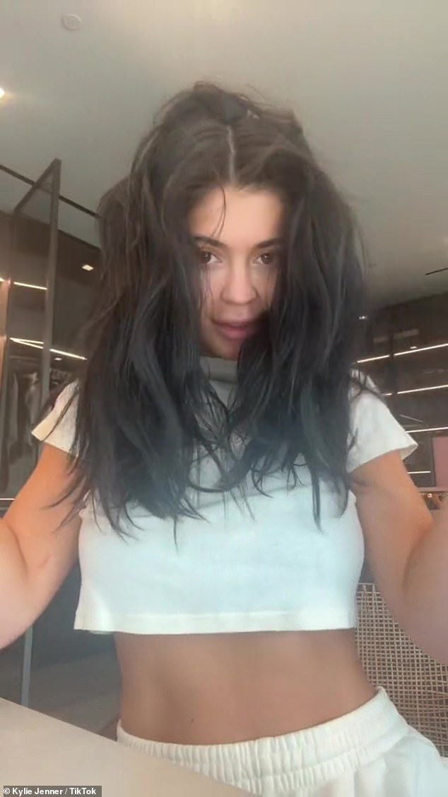 In the video, Kylie started by showing off her natural hair and talking about her hair journey
