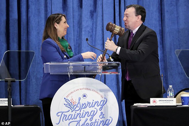 McDaniel hands the gavel to her co-chair after delivering her final speech as chair on March 8