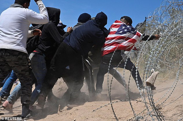 A day later, more groups tried to tear down the barbed wire at the border