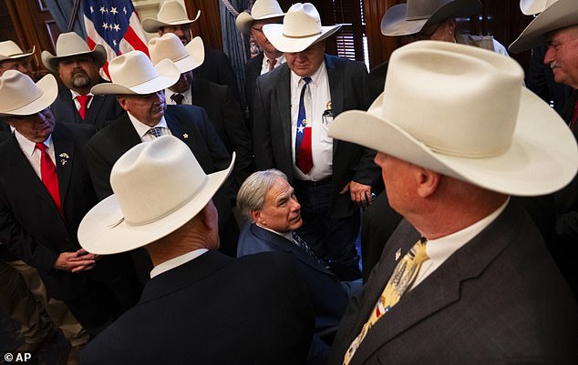 Texas Governor Greg Abbott greets sheriffs from counties across the state as part of effort to implement new powers to crack down on migrants crossing from Mexico