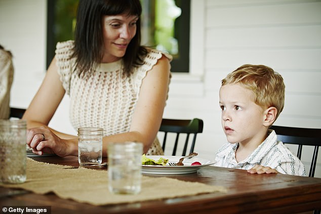 The woman, who was having an overwhelming day, started crying outside after his act of kindness.  (Image: a stock photo of a child with his mother)