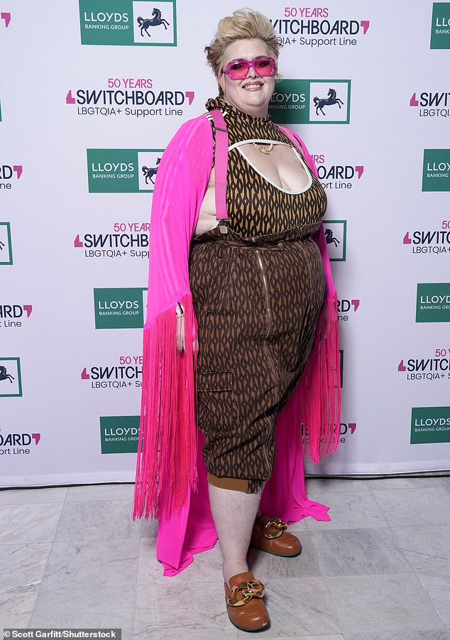 British comedian and actress Jaye Adams, who hosted the event, wore brown dungarees and a bright pink cardigan