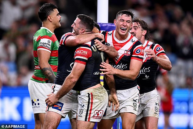 James Tedesco (centre) produced a masterclass as the Roosters defeated their fierce rivals 48-6