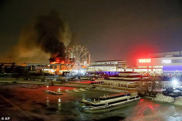 A massive fire can be seen above the Crocus City Hall on the western outskirts of Moscow, Russia