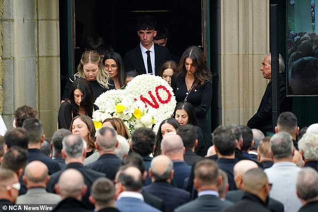 A heart with the word Nonno was carried by younger relatives