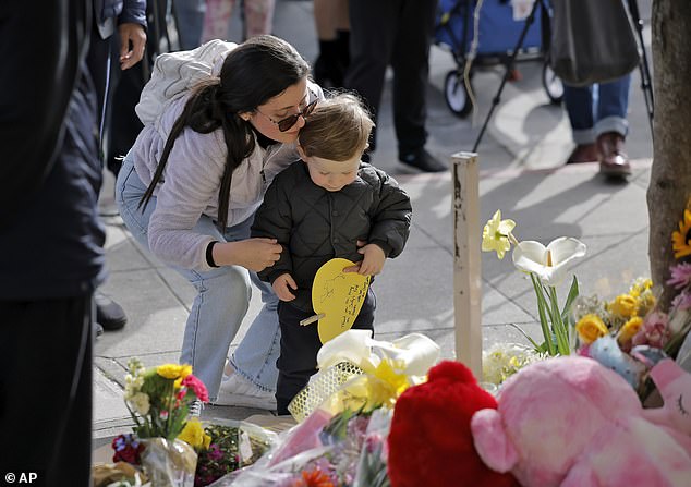 The crash site has since been covered in stuffed animals, flowers, candles and tributes