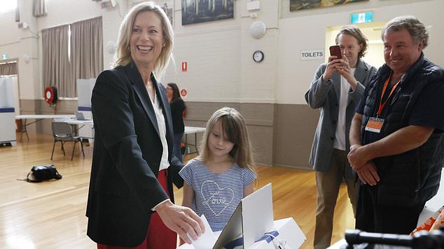 Labor leader Rebecca White, pictured with her daughter Mia, 7, cast her vote