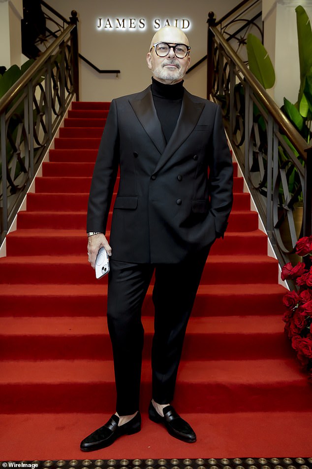 Love It Or List It star Neale Whitaker (pictured) was smart in black and opted for a well-tailored suit with satin lapels