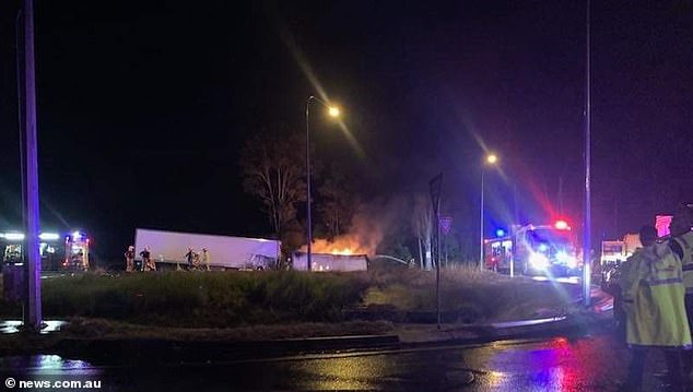 Emergency services, including firefighters, rushed to the scene to tackle the blaze (pictured) and parts of the highway were closed on Saturday as authorities investigated the cause of the incident