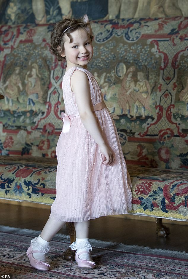 Mila coordinated with the Duchess of Cambridge by wearing a pink dress during their meeting at the Palace of Holyroodhouse in Edinburgh