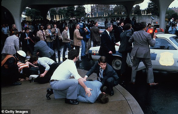 Injured in the attempted assassination of Reagan were press secretary James Brady and agent Timothy McCarthy.  The aftermath of the shooting can be seen above