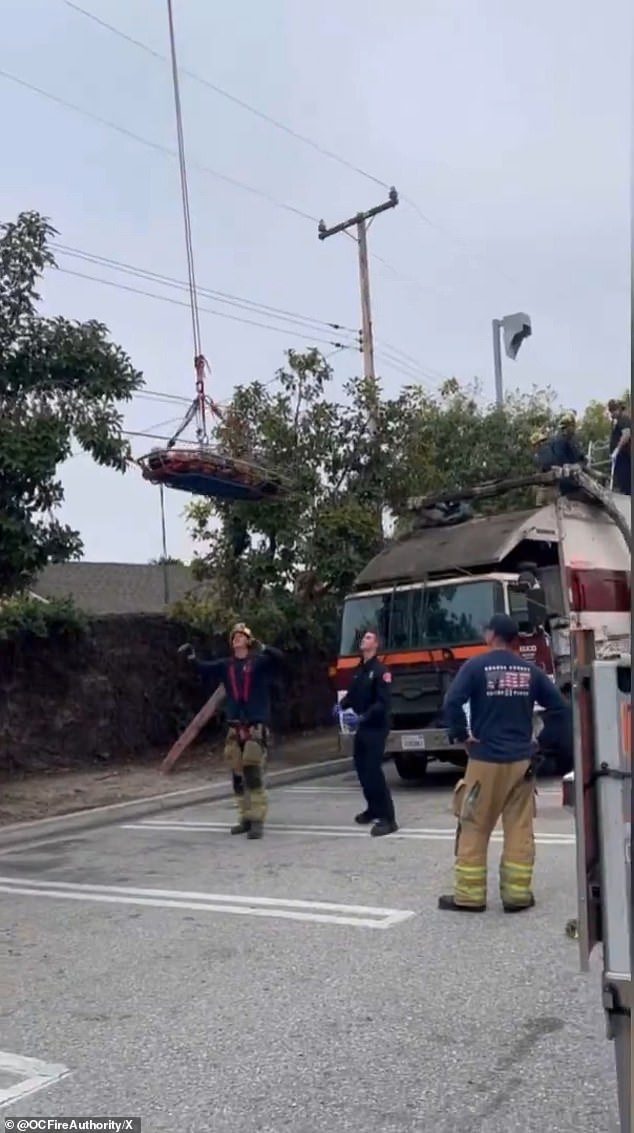 She was rescued Friday morning after the garbage truck driver heard noises coming from the vehicle