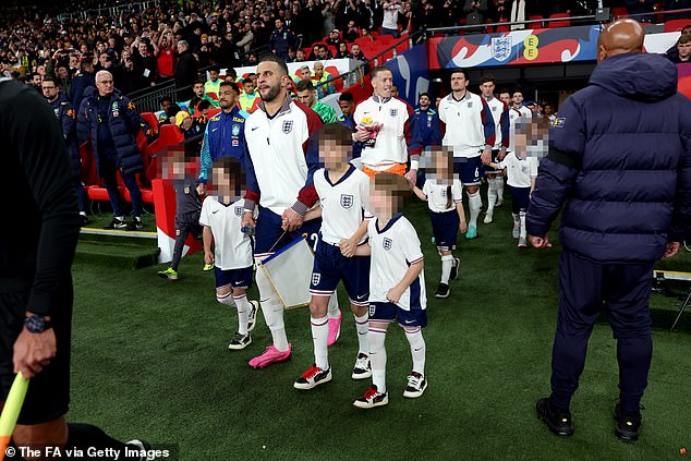 Kyle put the drama behind him as Roman, 11, Riaan, seven, and Reign, five, attended a mascot play held at Wembley Stadium