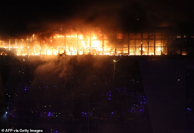 A photo shows the burning concert hall of the Crocus City Hall after the shooting incident in Krasnogorsk, outside Moscow