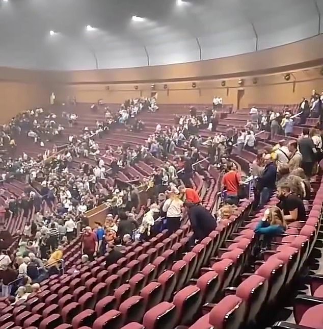 A video captures people evacuating Crocus City Hall in the Russian capital, where a sold-out concert by rock band Piknik took place