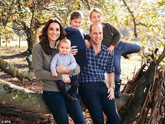 Prince William and Princess Kate, pictured with Prince George, Prince Charlotte and a baby Prince George at Anmer Hall in December 2018