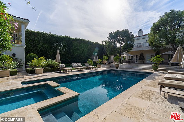 Located in the trendy Beverly Hills zip code 90210, the Mediterranean-style villa comes with a refreshing pool and hot tub at the rear