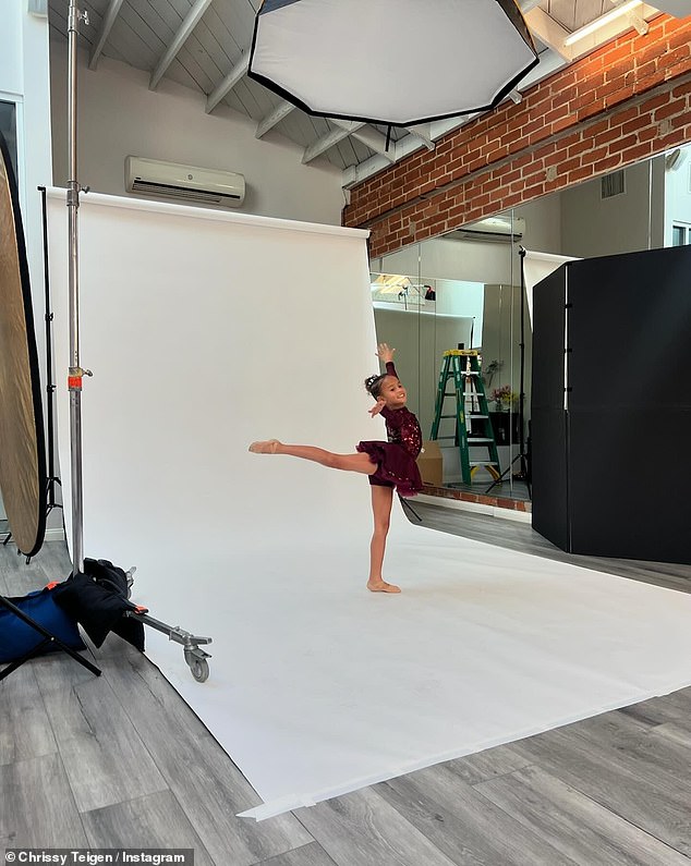Teigen also added a photo of Luna striking a pose during a photo shoot